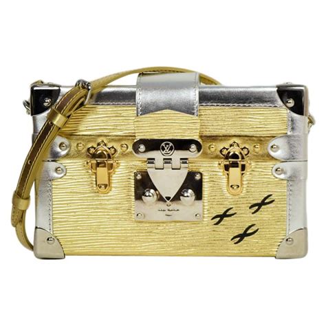 louis vuitton petite malle gold silver|jeune fille Louis Vuitton epi.